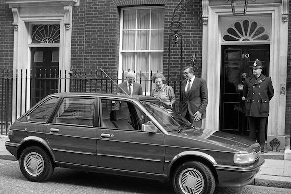Margaret Thatcher outside number 10 inspecting a car